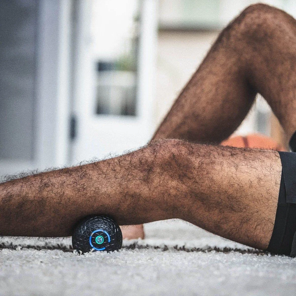 COMPEX Molecule Wibrująca piłka do masażu 4 prędkości wibracji ergonomiczna przenośna