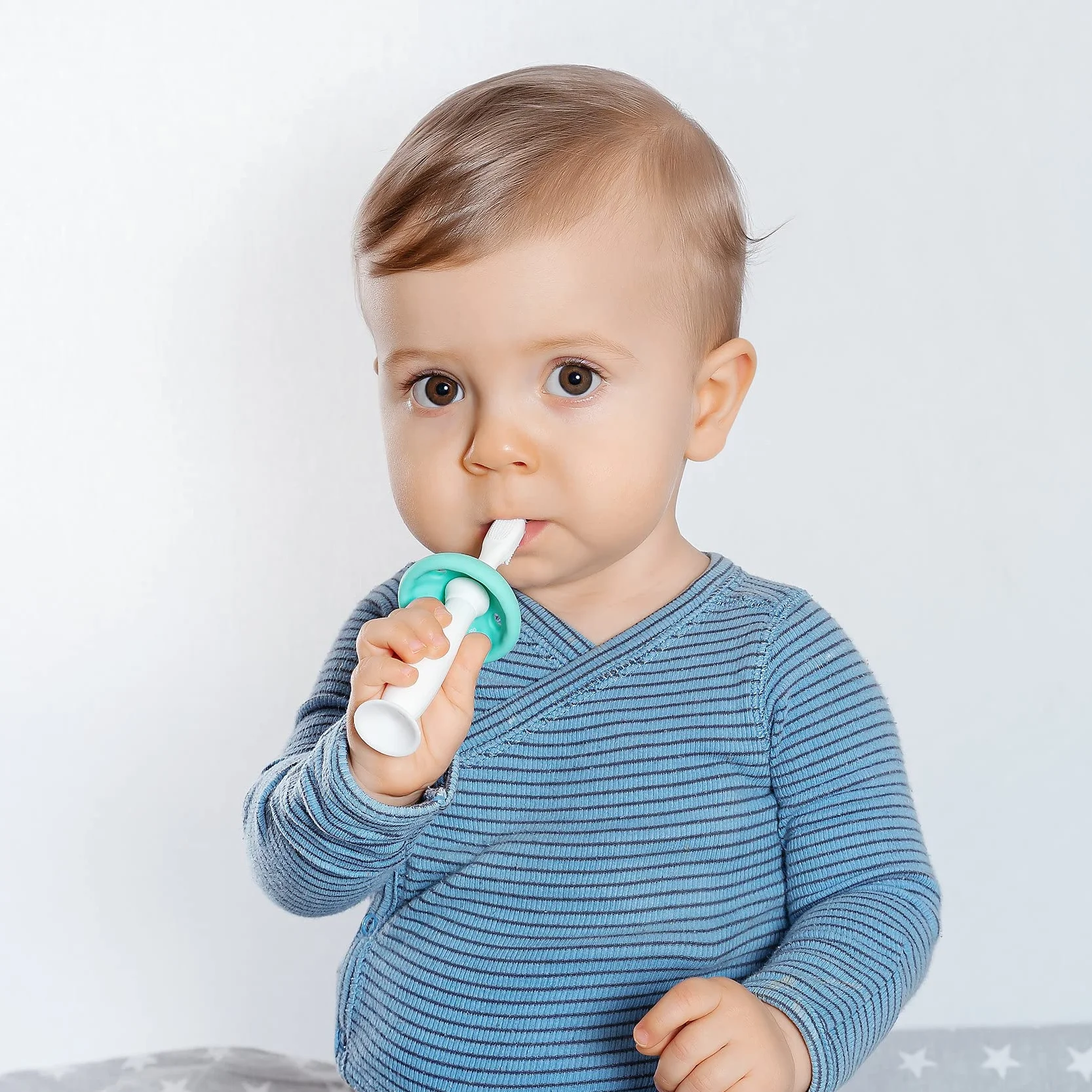 Reer BabyCare przyrząd do czyszczenia zębów dla niemowląt z medycznego silikonu, biały