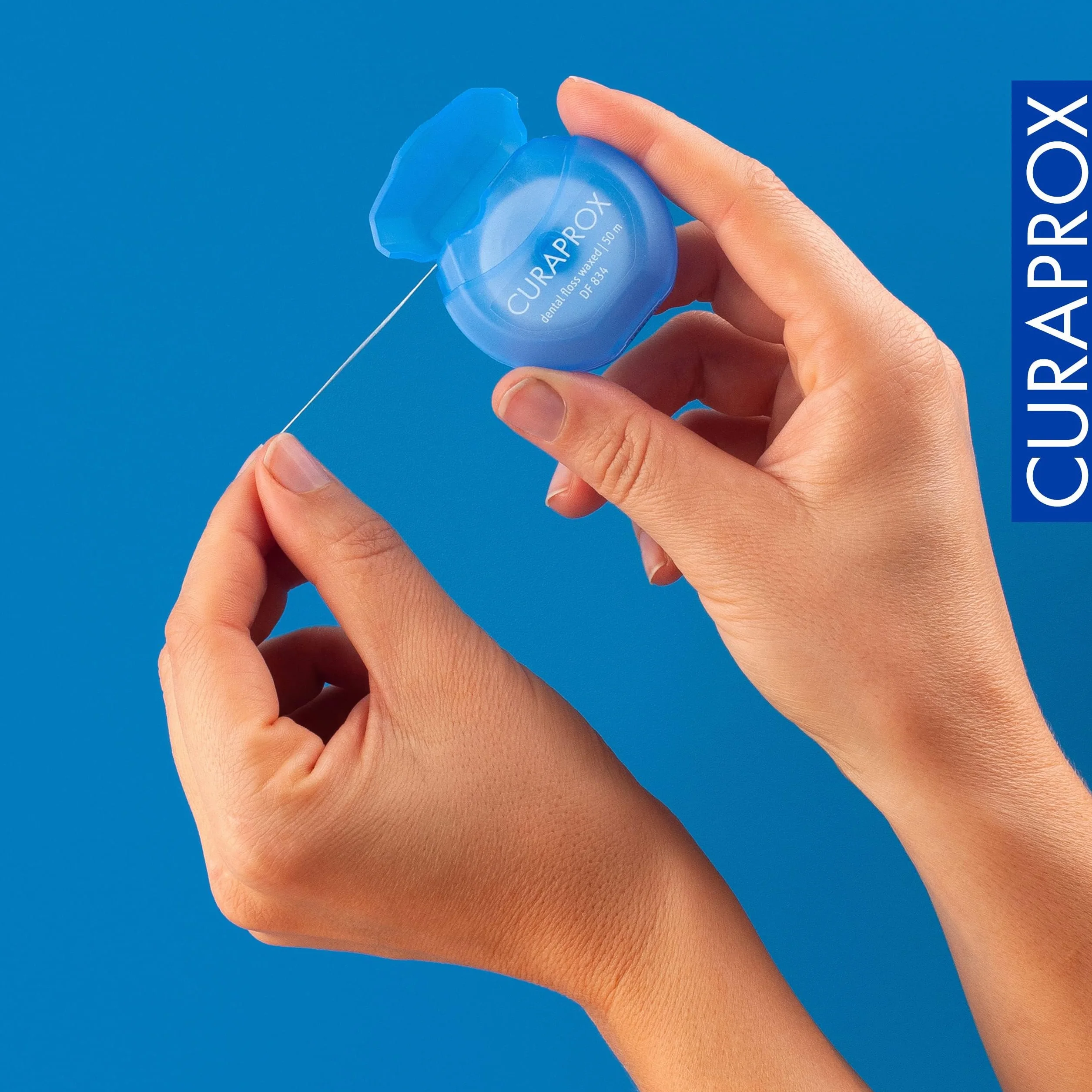 Curaprox DF 834 Nić Dentystyczna woskowana 50 m miętowy smak